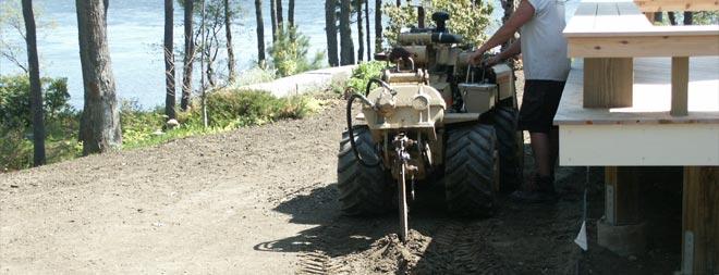 Underground piping being pulled into the soil Trenchless pipe installation